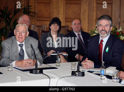 Democratic Unionist Party leader The Reverend Ian Paisley (left) and Sinn Fein President Gerry Adams speak to the media during a press conference at the Stormont Assembly building in Belfast. Stock Photo