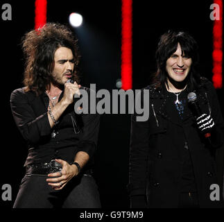 Russell Brand (left) & Noel Fielding perform as The Goth Detectives in a special, Teenage Cancer Trust comedy gig at the Royal Albert Hall in central London. Stock Photo