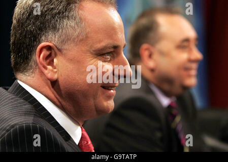 Scottish Labour leader Jack McConnell (left) and SNP leader Alex Salmond ahead of the STV Political Debate at The National Piping Centre in Glasgow. Stock Photo