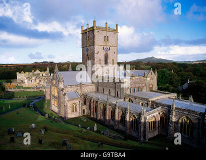 A general view of the exterior of St David's Cathedral looking NW with Bishop's Palace rear (L) the peak of Carn Llidi rear (R). Stock Photo