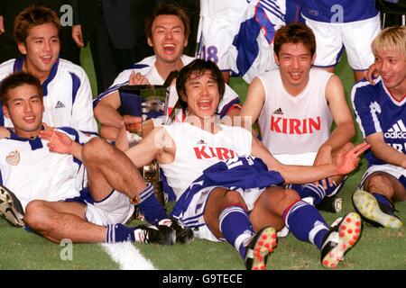 Soccer - Kirin Cup - Japan v Yugoslavia. The Japan team celebrate with the cup Stock Photo