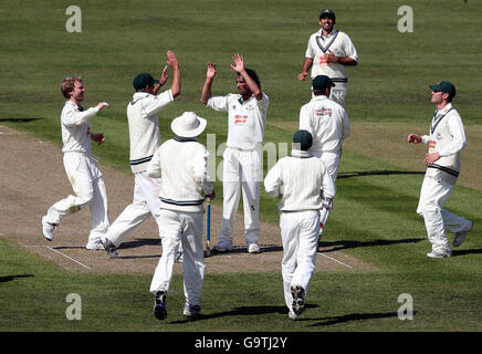 Worcestershire's Kabir Ali (centre) is congratulated by his team-mates after dissmissing Durham's Phil Mustard during the Liverpool Victoria County Championship Division One match at New Road, Worcester. Stock Photo