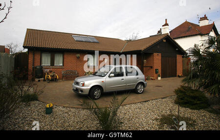 Mr Norman Gibbon who has solar panels on his roof as part of renewable energy, in Formby, Merseyside. Stock Photo