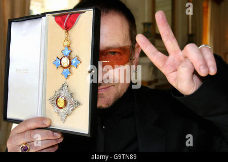 Bono receives honorary knighthood Stock Photo