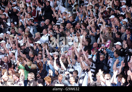 Hull FC fans celebrate a try against Hull KR during the engage Super League match at the Kingston Communications Stadium, Hull.