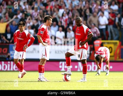 Soccer - FA Barclays Premiership - Charlton Athletic v Sheffield United - The Valley. L-R: Charlton Athletic's Zhi Zheng, Darren Ambrose and Darren Bent stand dejected after the Sheffield United equalising goal Stock Photo