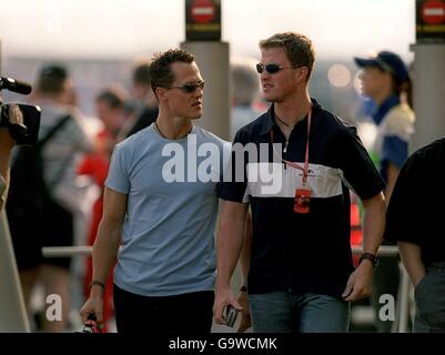 Formula One Motor Racing - German Grand Prix - Race. (L-R) Michael Schumacher with brother Ralf Stock Photo