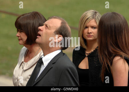 (Left to right) mother Julia Hawker, father Bill Hawker and sisters Lisa Hawker and Louise Hawker at the funeral service of Lindsay Ann Hawker at Coventry Cathedral. Stock Photo