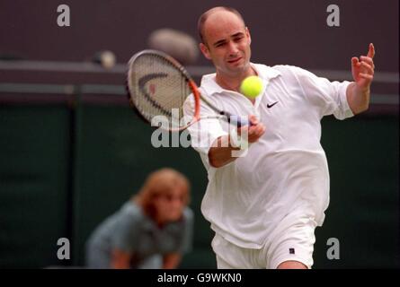 Tennis - Wimbledon 2001 - Fourth Round. Andre Agassi in action against Nicolas Kiefer Stock Photo