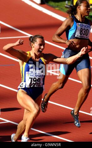 Ukraine's Zhanna Pintusevich-Block celebrates as she crosses the finsh line to win the final of the Womens 100 metres over favourite Marion Jones (right). Stock Photo