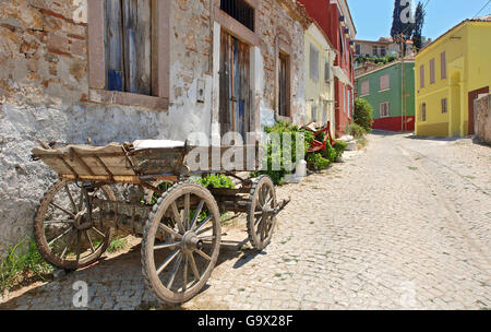 wooden cart on cobbled street in historic district, Ayvalik, Cunda, Balikesir, Turkey, Asia / Ayvalik Stock Photo