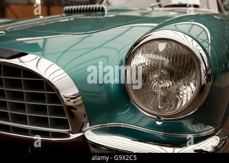 Front detail of Alfa Romeo classic car, lamp, chrome Stock Photo