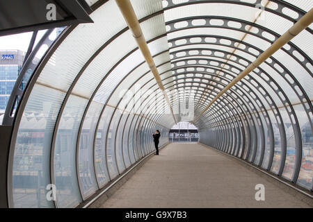 Poplar tunnel - walkway at DLR Docklands Light Railway station, London, United Kingdom Stock Photo