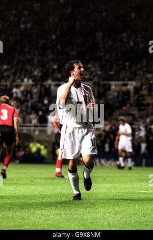 Robbie Fowler celebrates scoring England's second goal against Mexico
