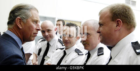 The Prince of Wales meets guards during a visit to Polmont Young Offenders Institute. Stock Photo