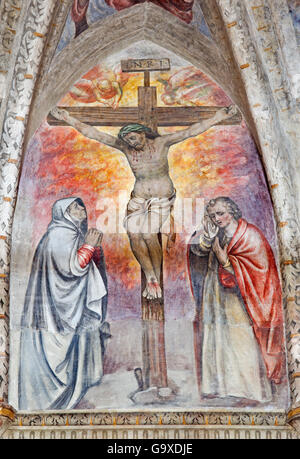BRESCIA, ITALY, 2016 - resco with the Crucifixion central motive in main apse of church Chiesa del Santissimo Corpo di Cristo Stock Photo