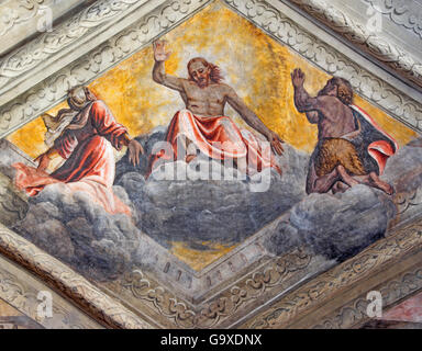 BRESCIA, ITALY, 2016 - Fresco of Jesus with Virgin Mary and St. John the Baptist in church Chiesa del Santissimo Corpo di Cristo Stock Photo