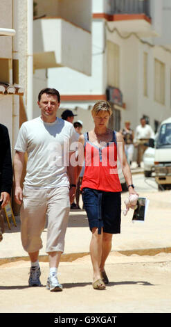 Girl missing in Algarve. Gerry McCann, father of Madeleine, walks from the local church after a short visit in Luz, Portugal. Stock Photo