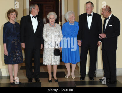 Britain's Queen Elizabeth II and the Duke of Edinburgh, right, stand for a group photo during a return dinner she hosted for US President George Bush, second left, and his wife Laura, left, which was also attended by his father and former President, George Bush Senior and wife Barbara at the Ambassador's Residence, Washington DC, on the final day of Her Majesty's state visit to America. Stock Photo