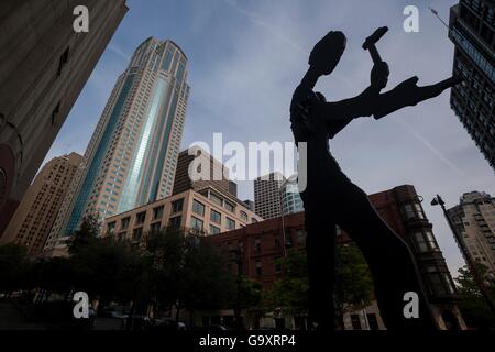 Hammering Man one in a series of monumental kinetic sculptures designed by Jonathan Borofsky outside the Seattle Art Museum in Seattle, Washington. Stock Photo