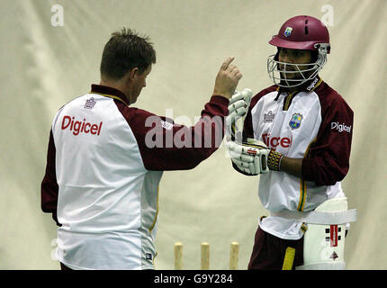 West Indies captain Ramnaresh Sarwan chats with coach David Moore during an indoor net session at the County Ground, Taunton. Stock Photo