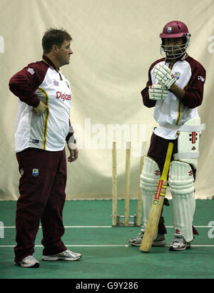 West Indies captain Ramnaresh Sarwan chats with coach David Moore during an indoor net session at the County Ground, Taunton. Stock Photo