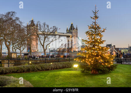 Tower Bridge is a combined bascule and suspension bridge in London and crosses the River Thames. Stock Photo