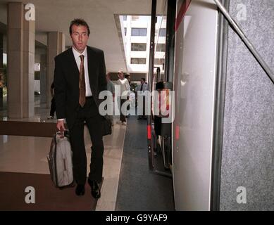 Manchester United's Laurent Blanc leaves the team hotel after all Eurpean Cup matches were called off after the tragedy in the United States Stock Photo