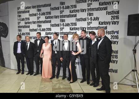 Makers of co-production film Anthropoid of British director Sean Ellis come to the world premiere of their film at the opening ceremony of the 51st Karlovy Vary International Film Festival in Karlovy Vary, Czech Republic, July 1, 2016. Pictured: director Sean Ellis (fifth from left), actor Jamie Dornan (third from left), actress Alena Mihulova (fourth from left), actress Ana Geislerova (fourth from right), actor Toby Jones (second from left), actor Vaclav Neuzil jr (second from right) and producer David Ondricek (first from right). (CTK Photo/Slavomir Kubes) Stock Photo