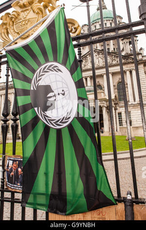 Belfast, UK, Europe. 4th July 2016. an Anonymous Flag tied to the Gates of Belfast city hall where protesters stage a rally. Credit:  Bonzo/Alamy Live News Stock Photo