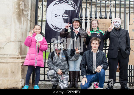 Belfast, UK, Europe. 4th July 2016. Anonymous protesters stage a rally at the gates of Belfast City hall. Credit:  Bonzo/Alamy Live News Stock Photo