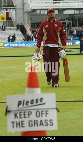 West Indies captain Ramnaresh Sarwan looks to the sky after inspecting the pitch Stock Photo