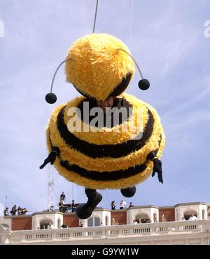 Jerry Seinfeld flies through the air dressed as a bee during a photocall for the animated feature Bee Movie. Picture date: Thursday 17 May, 2007. Photo credit should read: Anthony Harvey/PA Wire Stock Photo