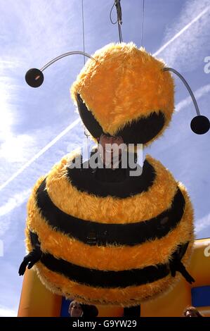 Jerry Seinfeld flies through the air dressed as a bee during a photocall for the animated feature Bee Movie. Picture date: Thursday 17 May, 2007. Photo credit should read: Anthony Harvey/PA Wire Stock Photo