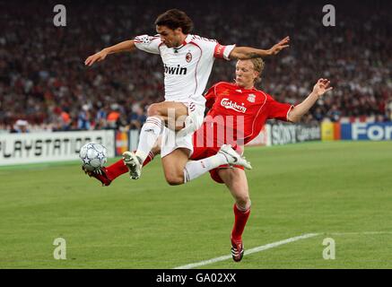 Soccer - UEFA Champions League - Final - AC Milan v Liverpool - Olympic Stadium. AC Milan's Paolo Maldini (left) jumps in to tackle Liverpool's Dirk Kuyt. Stock Photo