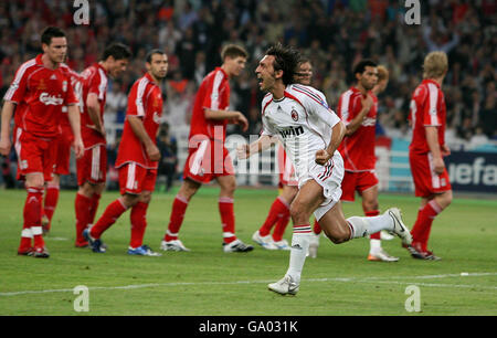 AC Milan's Andrea Pirlo celebrates after his free kick was deflected by Filippo Inzaghi to score against Liverpool as the team look dejected in the background during the Champions League Final at the Athens Olympic Stadium, Athens, Greece. Stock Photo