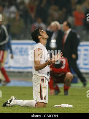 Soccer - UEFA Champions League - Final - AC Milan v Liverpool - Olympic Stadium. AC Milan's Ricardo Kaka celebrates after the final whistle as the Liverpool players stand dejected in the background. Stock Photo