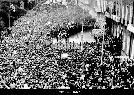 Some idea of the vast crowd which pressed it's way towards the British Embassy in Merrion Square, Dublin. A thin line of police managed to hold the people back just in front of the building. itself. Stock Photo