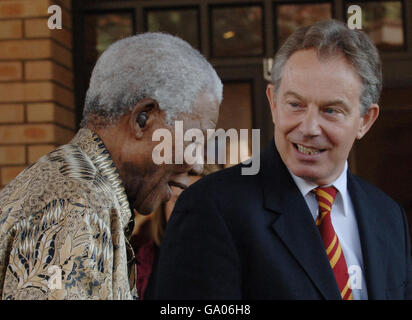 Tony Blair and former South African President Nelson Mandela at the Nelson Mandela Foundation in Johannesburg. Stock Photo