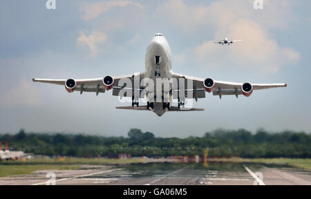 Gatwick airport stock. A Virgin Atlantic Boeing 747-400 passenger jet after take off from Gatwick Airport in Sussex. Stock Photo