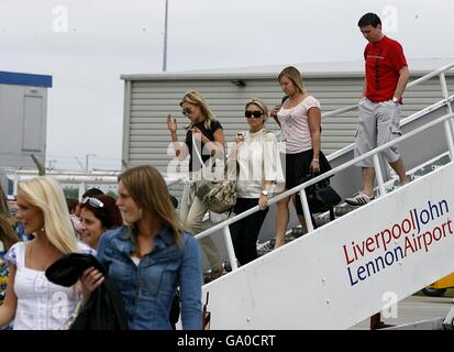 Soccer - UEFA Champions League - Liverpool Players return to John Lennon Airport Stock Photo