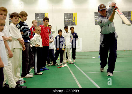 The Guard of Honour have a nets session in the Ken Barrington cricket centre as they wait for the rain to pass at the Brit Oval Stock Photo