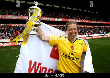 Soccer - FA Women's Cup - Final - Arsenal v Charlton Athletic - City Ground. Arsenal's captain Jayne Ludlow celebrates victory with the FA Cup trophy. Stock Photo
