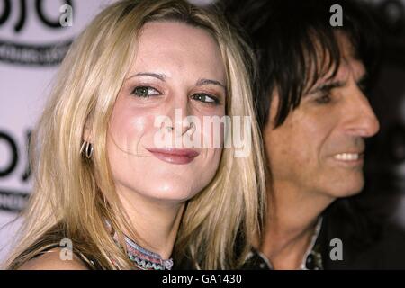 Alice Cooper and his daughter Calico arrive for the Mojo Honours List award ceremony at The Brewery, east London. Stock Photo