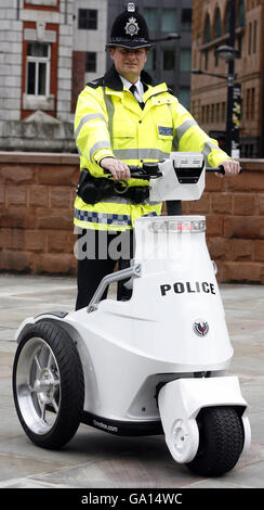 PC Colin Chamberlain of Greater Manchester demonstrates the T3 personal mobility vehicle during the Association of Chief Police Officers annual conference at the Midland Hotel, Manchester. Stock Photo