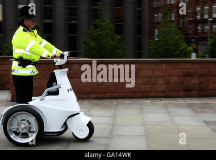 PC Colin Chamberlain of Greater Manchester demonstrates the T3 personal mobility vehicle during the Association of Chief Police Officers annual conference at the Midland Hotel, Manchester. Stock Photo