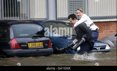 City centre residents make their way home after the banks of the River ...