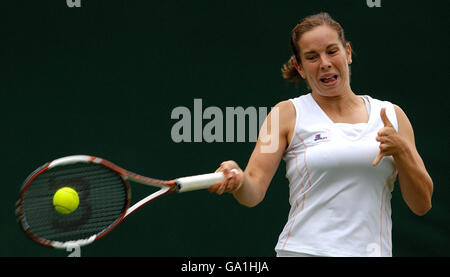 Great Britain's Katie O'Brien in action against Germany's Sandra Kloesel during The All England Lawn Tennis Championship at Wimbledon. Stock Photo