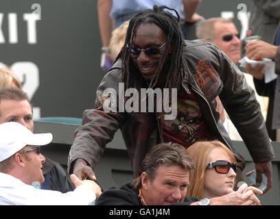 Boyd Tinsley, a member of The Dave Matthews Band in the Royal Box on Centre Court during The All England Lawn Tennis Championship at Wimbledon. Stock Photo