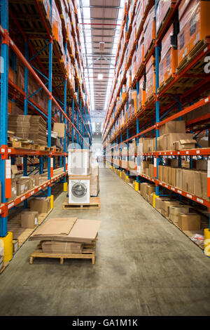 View of cardboard boxes tidy on shelves Stock Photo